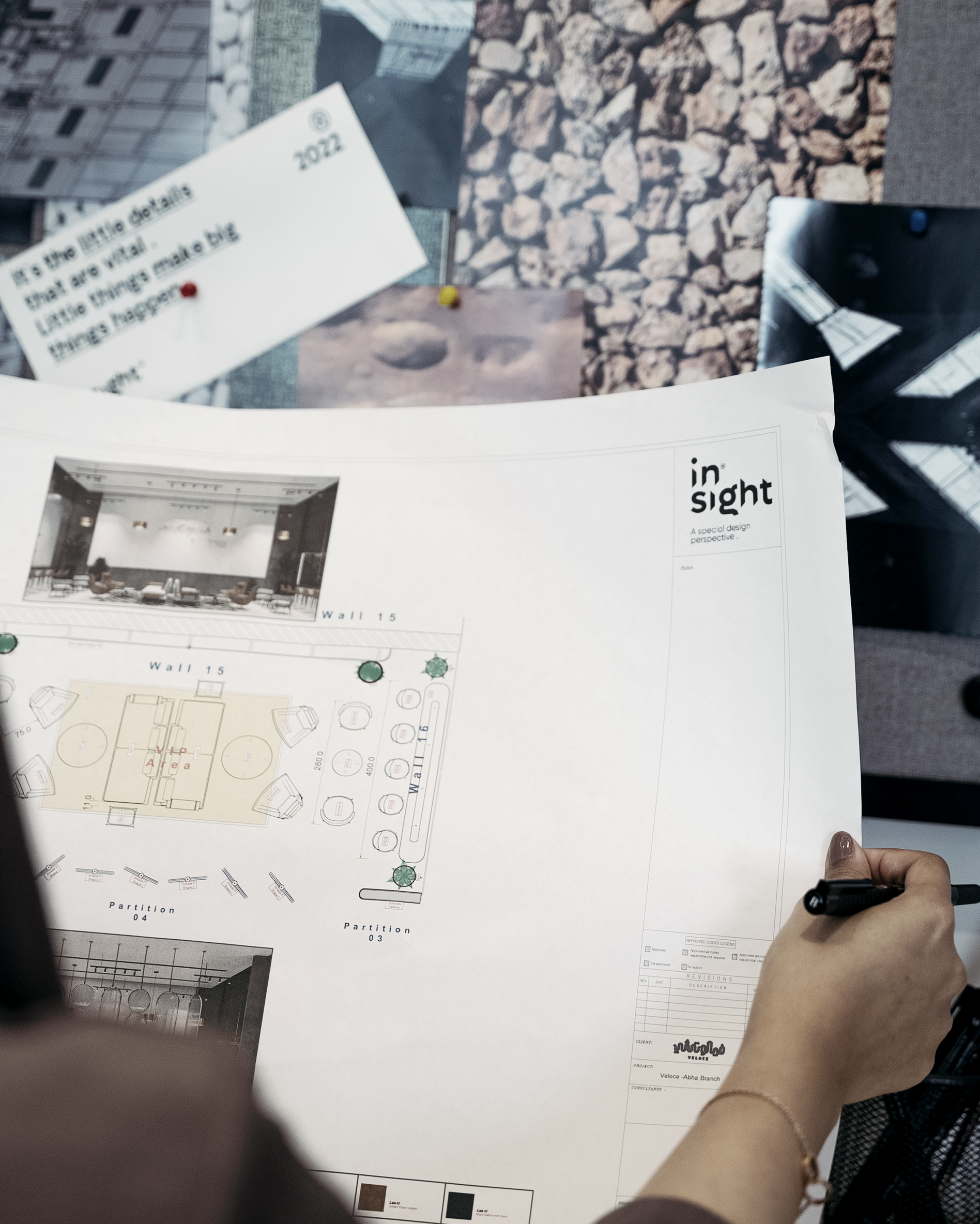 Mood-board and architectural plans on a pin-board